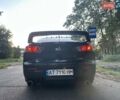 Черный Мицубиси Лансер, объемом двигателя 2 л и пробегом 188 тыс. км за 6900 $, фото 2 на Automoto.ua