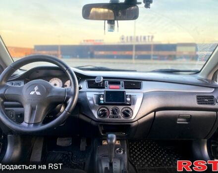 Чорний Міцубісі Lancer, об'ємом двигуна 1.6 л та пробігом 375 тис. км за 4899 $, фото 10 на Automoto.ua