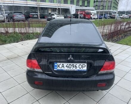 Черный Мицубиси Лансер, объемом двигателя 1.6 л и пробегом 226 тыс. км за 3750 $, фото 3 на Automoto.ua