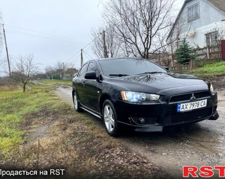 Черный Мицубиси Лансер, объемом двигателя 2 л и пробегом 226 тыс. км за 6600 $, фото 5 на Automoto.ua
