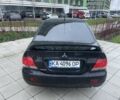 Черный Мицубиси Лансер, объемом двигателя 1.6 л и пробегом 226 тыс. км за 3750 $, фото 3 на Automoto.ua