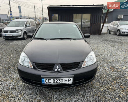 Черный Мицубиси Лансер, объемом двигателя 1.58 л и пробегом 202 тыс. км за 4100 $, фото 22 на Automoto.ua