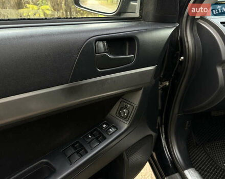 Черный Мицубиси Лансер, объемом двигателя 1.5 л и пробегом 285 тыс. км за 4800 $, фото 18 на Automoto.ua