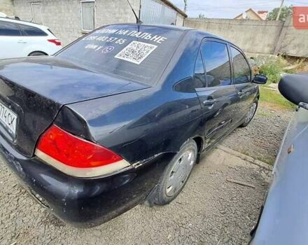 Черный Мицубиси Лансер, объемом двигателя 1.58 л и пробегом 316 тыс. км за 2200 $, фото 7 на Automoto.ua