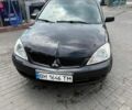 Чорний Міцубісі Lancer, об'ємом двигуна 1.58 л та пробігом 320 тис. км за 5000 $, фото 1 на Automoto.ua
