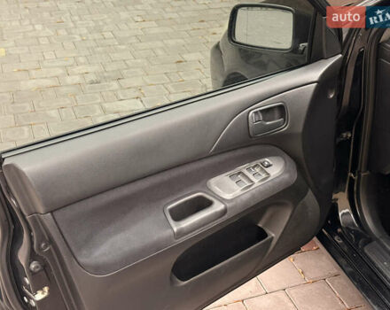 Чорний Міцубісі Lancer, об'ємом двигуна 1.6 л та пробігом 265 тис. км за 4700 $, фото 15 на Automoto.ua