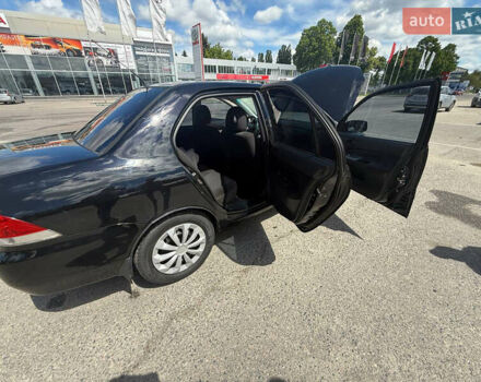 Чорний Міцубісі Lancer, об'ємом двигуна 1.6 л та пробігом 292 тис. км за 3600 $, фото 14 на Automoto.ua