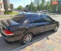 Черный Мицубиси Лансер, объемом двигателя 1.6 л и пробегом 248 тыс. км за 4200 $, фото 4 на Automoto.ua