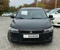 Чорний Міцубісі Lancer, об'ємом двигуна 2 л та пробігом 239 тис. км за 6900 $, фото 1 на Automoto.ua