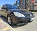 Черный Мицубиси Лансер, объемом двигателя 1.6 л и пробегом 248 тыс. км за 4200 $, фото 9 на Automoto.ua