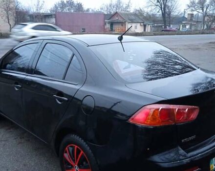 Черный Мицубиси Лансер, объемом двигателя 1.5 л и пробегом 177 тыс. км за 5100 $, фото 7 на Automoto.ua