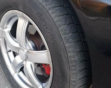 Чорний Міцубісі Lancer, об'ємом двигуна 1.58 л та пробігом 286 тис. км за 4950 $, фото 2 на Automoto.ua