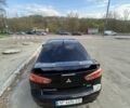 Черный Мицубиси Лансер, объемом двигателя 1.47 л и пробегом 208 тыс. км за 6300 $, фото 5 на Automoto.ua