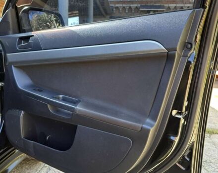 Чорний Міцубісі Lancer, об'ємом двигуна 2 л та пробігом 230 тис. км за 6650 $, фото 16 на Automoto.ua