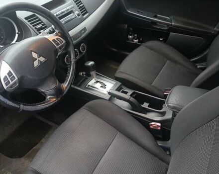 Черный Мицубиси Лансер, объемом двигателя 2 л и пробегом 192 тыс. км за 6350 $, фото 17 на Automoto.ua