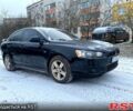 Черный Мицубиси Лансер, объемом двигателя 2 л и пробегом 246 тыс. км за 6200 $, фото 1 на Automoto.ua