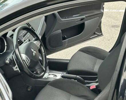 Чорний Міцубісі Lancer, об'ємом двигуна 2 л та пробігом 199 тис. км за 7900 $, фото 49 на Automoto.ua