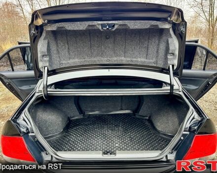 Черный Мицубиси Лансер, объемом двигателя 1.6 л и пробегом 216 тыс. км за 5190 $, фото 13 на Automoto.ua