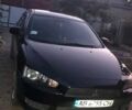 Чорний Міцубісі Lancer, об'ємом двигуна 1.5 л та пробігом 188 тис. км за 5400 $, фото 1 на Automoto.ua