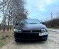 Чорний Міцубісі Lancer, об'ємом двигуна 1.5 л та пробігом 183 тис. км за 6400 $, фото 9 на Automoto.ua