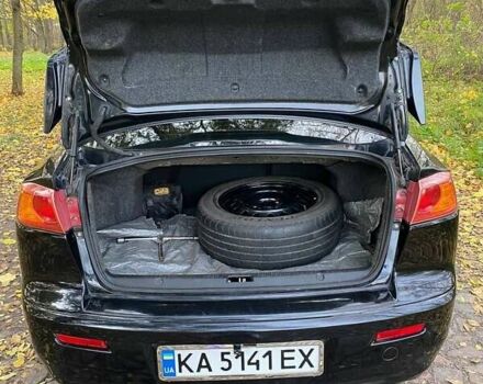 Чорний Міцубісі Lancer, об'ємом двигуна 2 л та пробігом 237 тис. км за 7500 $, фото 11 на Automoto.ua