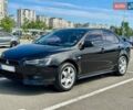 Чорний Міцубісі Lancer, об'ємом двигуна 2 л та пробігом 265 тис. км за 7500 $, фото 1 на Automoto.ua