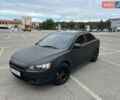 Чорний Міцубісі Lancer, об'ємом двигуна 2 л та пробігом 163 тис. км за 5700 $, фото 1 на Automoto.ua