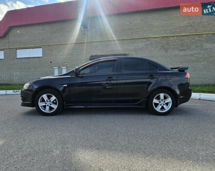 Чорний Міцубісі Lancer, об'ємом двигуна 2 л та пробігом 249 тис. км за 6500 $, фото 5 на Automoto.ua