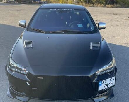 Чорний Міцубісі Lancer, об'ємом двигуна 2 л та пробігом 223 тис. км за 7800 $, фото 1 на Automoto.ua
