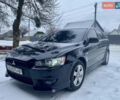 Чорний Міцубісі Lancer, об'ємом двигуна 2 л та пробігом 180 тис. км за 6999 $, фото 1 на Automoto.ua