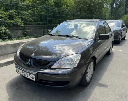 Чорний Міцубісі Lancer, об'ємом двигуна 1.6 л та пробігом 78 тис. км за 3999 $, фото 10 на Automoto.ua