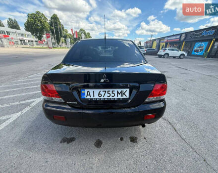Чорний Міцубісі Lancer, об'ємом двигуна 1.6 л та пробігом 292 тис. км за 3600 $, фото 5 на Automoto.ua