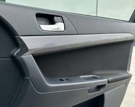 Чорний Міцубісі Lancer, об'ємом двигуна 2 л та пробігом 199 тис. км за 7900 $, фото 39 на Automoto.ua