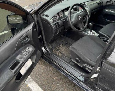 Чорний Міцубісі Lancer, об'ємом двигуна 1.6 л та пробігом 245 тис. км за 4500 $, фото 14 на Automoto.ua