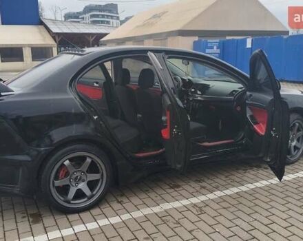 Чорний Міцубісі Lancer, об'ємом двигуна 2 л та пробігом 160 тис. км за 8000 $, фото 5 на Automoto.ua