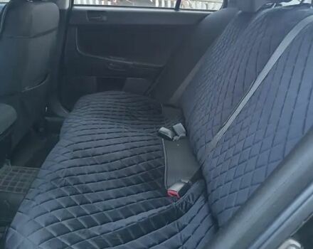 Мицубиси Лансер 2008 в Львове на Automoto.ua Черный Мицубиси Лансер, объемом двигателя 2 л и пробегом 210 тыс. км за 6500 $, фото 10 на Automoto.ua