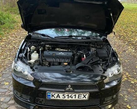 Чорний Міцубісі Lancer, об'ємом двигуна 2 л та пробігом 237 тис. км за 7500 $, фото 19 на Automoto.ua