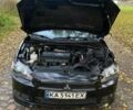 Чорний Міцубісі Lancer, об'ємом двигуна 2 л та пробігом 237 тис. км за 7500 $, фото 19 на Automoto.ua