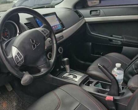 Чорний Міцубісі Lancer, об'ємом двигуна 2 л та пробігом 302 тис. км за 7200 $, фото 8 на Automoto.ua
