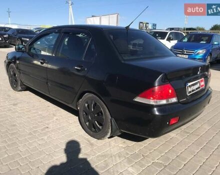Мицубиси Лансер 2008 в Львове на Automoto.ua Черный Мицубиси Лансер, объемом двигателя 1.6 л и пробегом 356 тыс. км за 4590 $, фото 12 на Automoto.ua