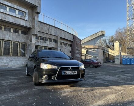 Черный Мицубиси Лансер, объемом двигателя 2 л и пробегом 236 тыс. км за 6550 $, фото 3 на Automoto.ua