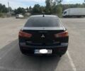 Чорний Міцубісі Lancer, об'ємом двигуна 2 л та пробігом 221 тис. км за 6300 $, фото 3 на Automoto.ua