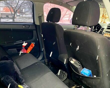 Черный Мицубиси Лансер, объемом двигателя 2 л и пробегом 246 тыс. км за 6200 $, фото 12 на Automoto.ua