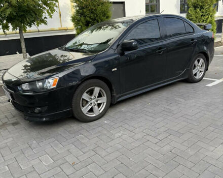 Чорний Міцубісі Lancer, об'ємом двигуна 2 л та пробігом 215 тис. км за 6700 $, фото 5 на Automoto.ua