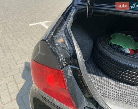 Чорний Міцубісі Lancer, об'ємом двигуна 1.6 л та пробігом 296 тис. км за 4200 $, фото 52 на Automoto.ua