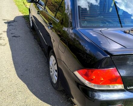 Черный Мицубиси Лансер, объемом двигателя 1.6 л и пробегом 232 тыс. км за 4400 $, фото 8 на Automoto.ua