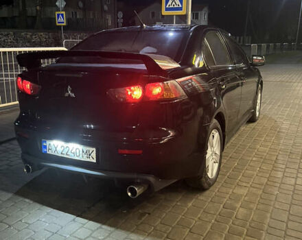 Черный Мицубиси Лансер, объемом двигателя 2 л и пробегом 270 тыс. км за 5400 $, фото 6 на Automoto.ua