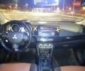 Черный Мицубиси Лансер, объемом двигателя 2 л и пробегом 240 тыс. км за 6400 $, фото 14 на Automoto.ua