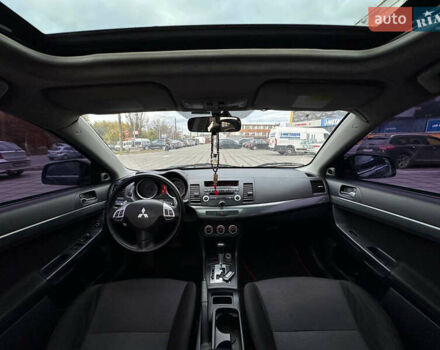 Черный Мицубиси Лансер, объемом двигателя 2 л и пробегом 236 тыс. км за 7950 $, фото 11 на Automoto.ua