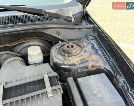 Чорний Міцубісі Lancer, об'ємом двигуна 1.6 л та пробігом 296 тис. км за 4200 $, фото 10 на Automoto.ua